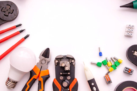 Electrical Tools and Components on White Background.