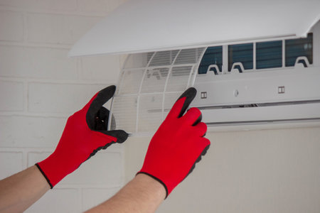 air conditioner filter replacement HVAC maintenance clean air ventilation.の写真素材