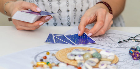Fortune teller reading with tarot cards. light fortune teller.