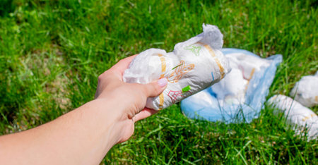 Diaper waste, dirty diapers. Disposal. The impact of disposable diapers on the environment. Environmental pollutionの写真素材