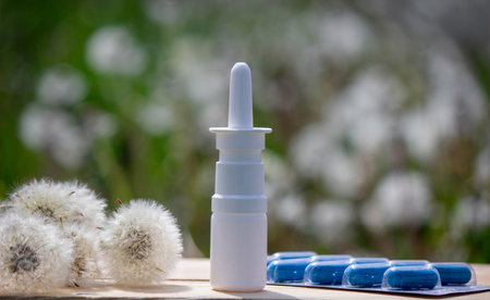allergy pills spray dandelion drops. Selective focus.の写真素材