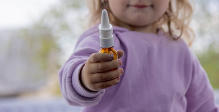 child spray from snot. Cold flu prevention Selective focus.の写真素材
