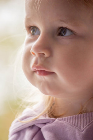 Close-up of a small child's face and nose. Cold, runny nose in children, allergiesの写真素材