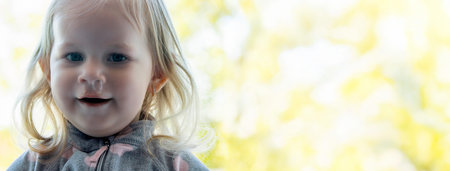 Close-up of a little girl with a cold virus. Selective focus.