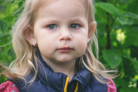 The little girl has a snot. Spring allergies.
