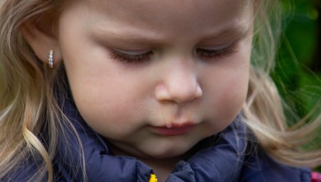 The little girl has a snot. Spring allergies.