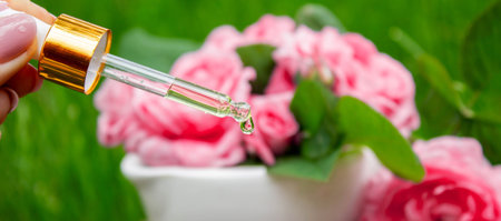 Rose essential oil in a bottle.essential oilsの写真素材
