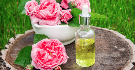 Rose essential oil in a bottle.essential oilsの写真素材