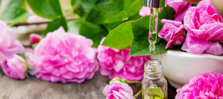 Rose essential oil in a bottle.essential oilsの写真素材