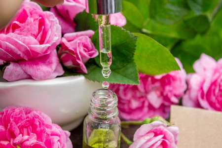 Rose essential oil in a bottle.essential oilsの写真素材