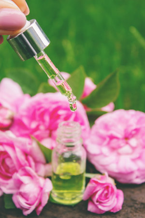 Rose essential oil in a bottle.essential oilsの写真素材