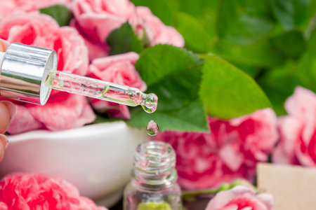 Rose essential oil in a bottle.essential oilsの写真素材