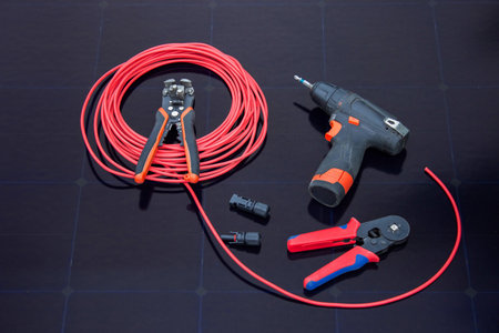 solar panel electrician tools red cable installation equipment renewable energy.の写真素材
