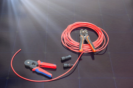 solar panel electrician tools red cable installation equipment renewable energy.
