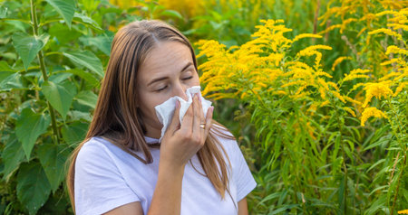 A woman is allergic to ragweed. Natureの写真素材