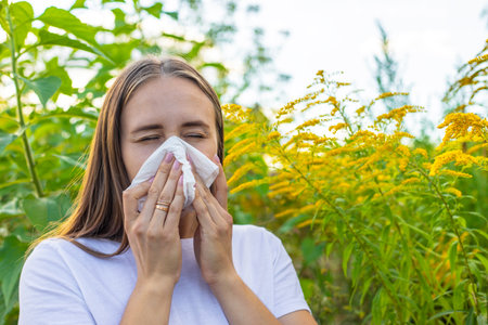 A woman is allergic to ragweed. Natureの写真素材