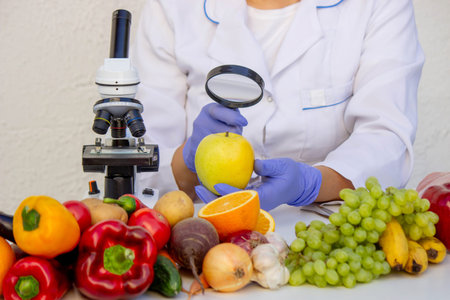 Freshness Inspection. Specialist Examining an Apple with a Magnifier Near a Microscope