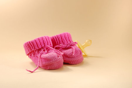 Baby booties and pacifier 