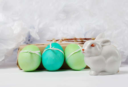 Vintage still life with easter eggs and gift boxes in craft paperの写真素材