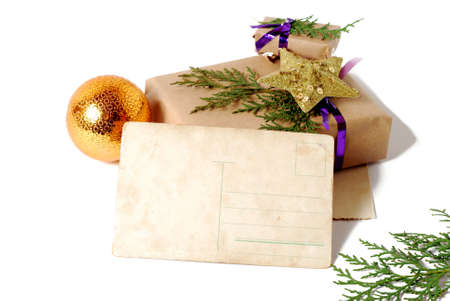 Craft gift boxes with greeting card for text. Christmas, New Year holiday background isolated on whiteの写真素材