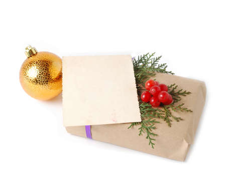 Craft gift boxes with greeting card for text. Christmas, New Year holiday background isolated on whiteの写真素材