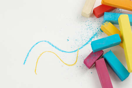 Group of bright color chalks isolated on white backgroundの写真素材