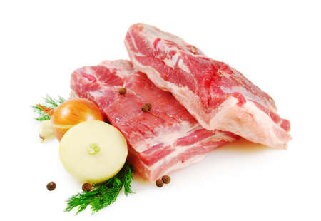 Raw Meat. Pork belly with dill, onion and tomato isolated on white backgroundの写真素材