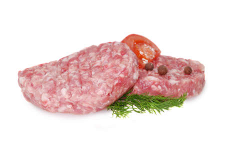Fresh raw meat. two hamburgers isolated on white backgroundの写真素材