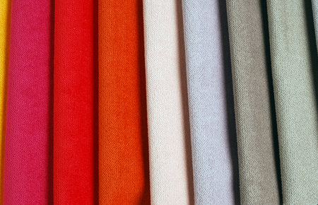 Bright collection of colorful velour textile samples. Fabric texture background