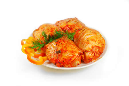 Raw meat. Pork escalope slices with sauce in a Dish Isolated Against White Backgroundの写真素材