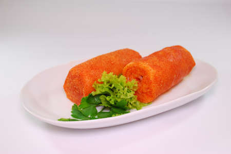 rolled lard bacon pork with hot pepper and spices isolated on a white background. Traditional ukrainian snack to vodka.の写真素材