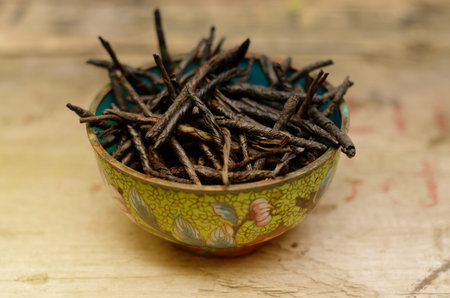 Wellness Tea drink, Bitter Twisted Leaves of Ilex Kudingcha. Green tea Kudingの写真素材