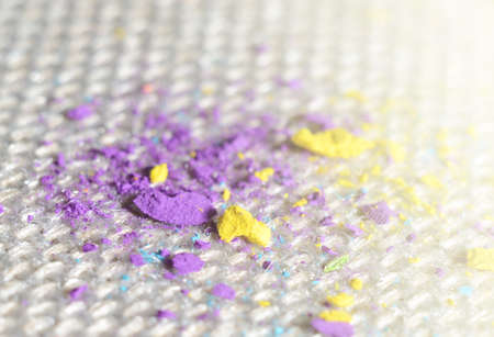 Close up picture of bright colorful powder on gunny textile. Concept photo for easy clean surfacesの写真素材