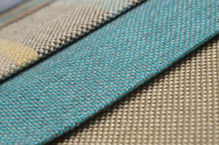 Bright collection of colorful gunny textile samples. Fabric texture background
