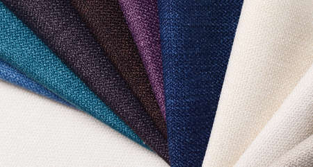 Bright collection of gunny textile samples. Fabric texture background.の写真素材