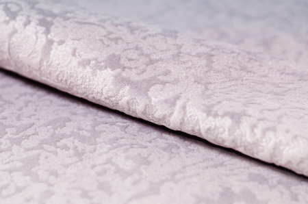 Beige collection of colorful velour textile samples. Fabric texture background