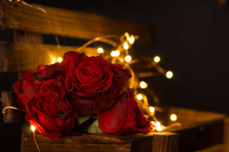 Red roses in the darkness.の写真素材