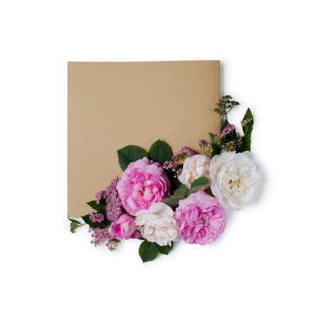 Background of tea roses flowers on a gentle pink background. Flat lay template.の写真素材