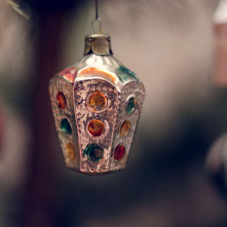 Old Soviet Russian Christmas and New Year decor on a spruce branch. Traffic light toyの写真素材
