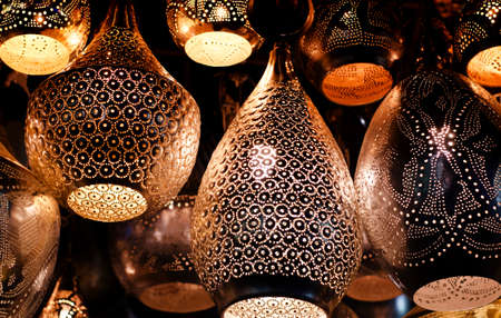 Traditional islamic lantern on a store of an old arabian market.の写真素材