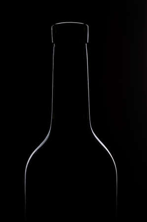 Wine bottle silhouette against black background. Low-Key background.の写真素材
