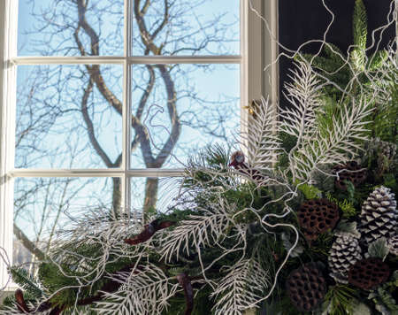 WALBRZYCH, POLAND - 30.11.2019: Christmas decoration and view through the window of the amazing Ksiaz castle in Walbrzych Lower Silesia.のeditorial素材
