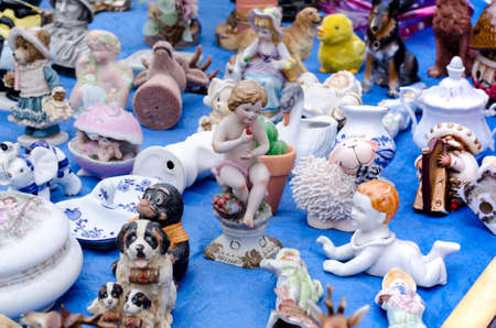 Wroclaw, Poland - 01.12.2019: different figures of animals, Cherubs. characters another old objects for sale on the Flea Market, swap meet in Wroclaw, Poland.のeditorial素材
