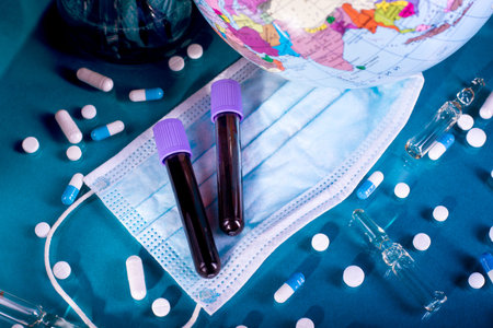 Blood test semple in lab. Coronavirus 2019-nCoV concept still life with blood test and drugs. COVID-19 background.の写真素材