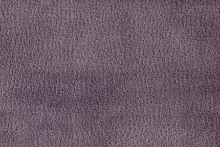 Close-up photo of manmade suede or velour textile texture background. Fabric backdropの写真素材