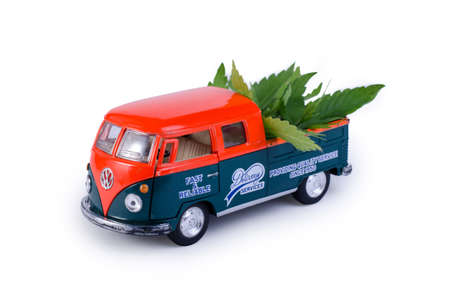 Kiev Ukraine - May 29, 2019. Toy model of Volkswagen Type 2, T1, Pickup 2 with cannabis leaves on the boardのeditorial素材