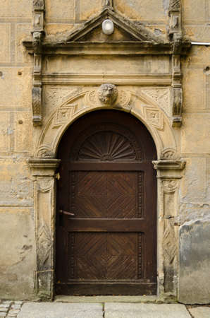 Beautiful aged wooden doors in an ancient building.のeditorial素材