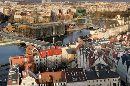 Wroclaw, Poland - 01.12.2019: Bird Eye View to rooftops of houses and Odra River in Wroclaw., Poland. View from the top of central Tower. View of old town Breslauのeditorial素材