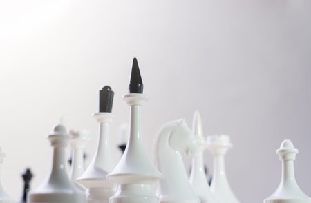 Checkmate Chess pieces on Chessboard. Chess opening tournament announcement background.の写真素材