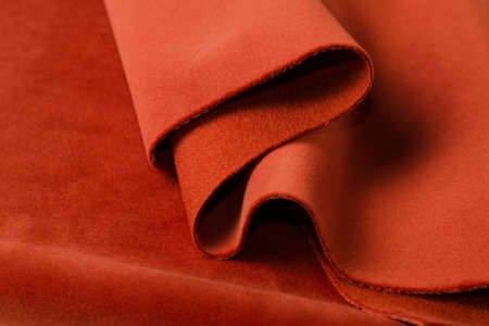 Beige and coral colors soft velor fabrics textile samples .. Fabric texture background.の写真素材